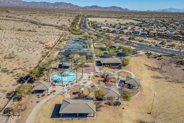 drone / aerial view featuring a mountain view