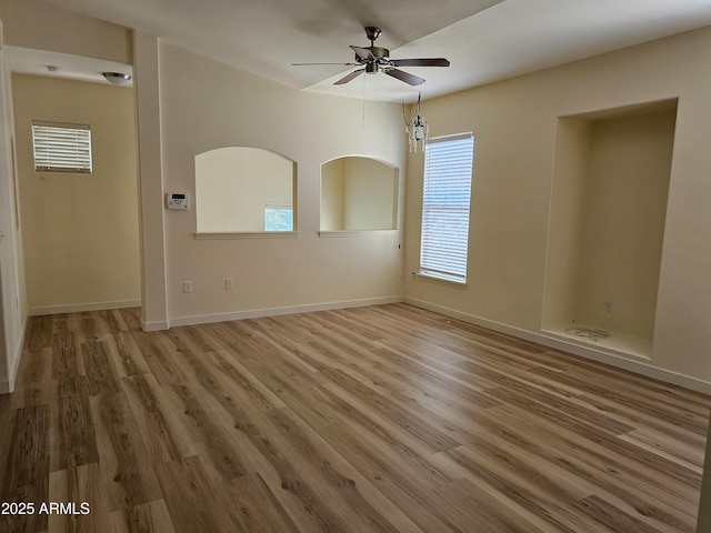 14250 W Wigwam Blvd Unit 1723, Litchfield Park, AZ 85340 - spare room featuring ceiling fan and wood finished floors