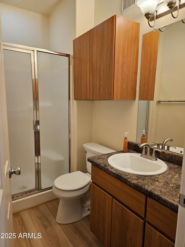 14250 W Wigwam Blvd Unit 1723, Litchfield Park, AZ 85340 - full bath featuring wood finished floors, a stall shower, and vanity