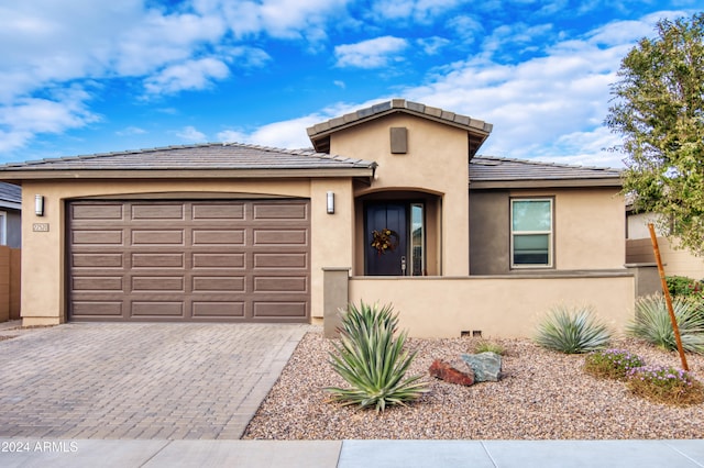 view of front of home featuring a garage