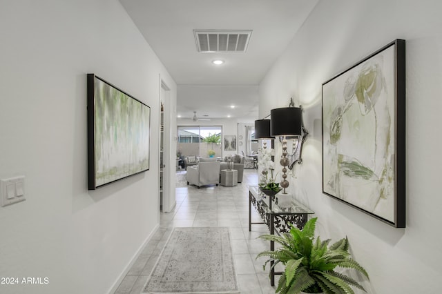 hallway with light tile patterned flooring