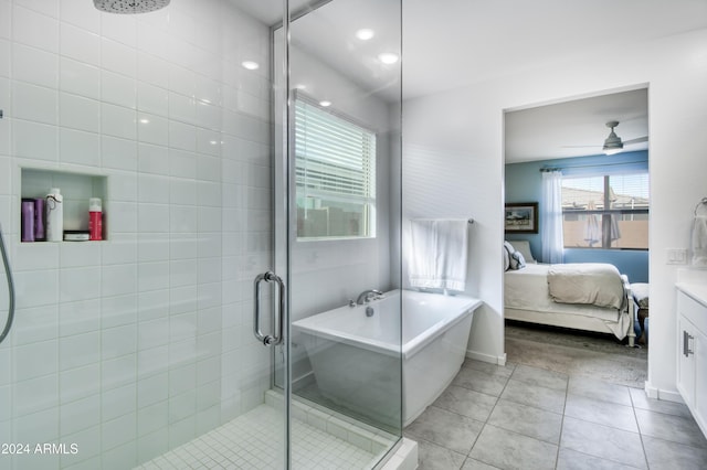 bathroom with tile patterned flooring, vanity, ceiling fan, and independent shower and bath