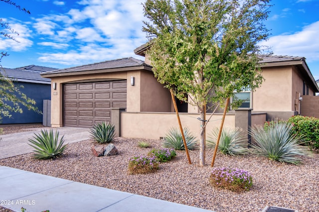 view of front of property featuring a garage