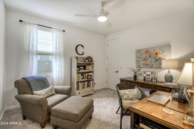 office with light carpet and ceiling fan