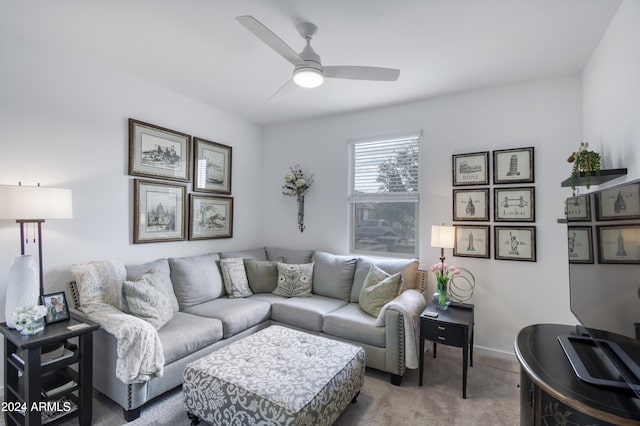 living room featuring ceiling fan and carpet floors