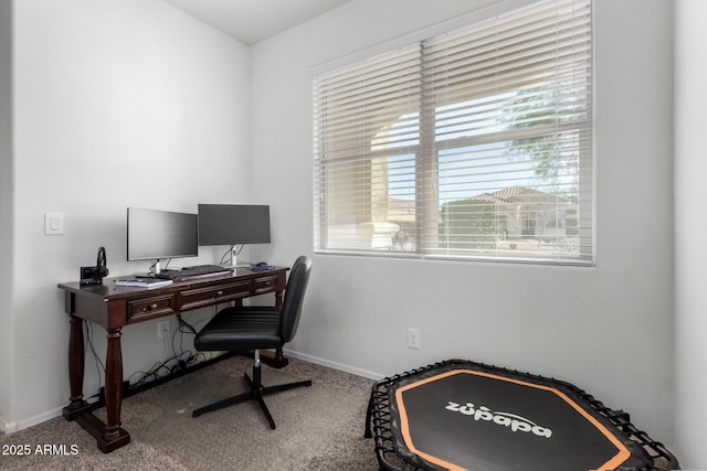 home office featuring carpet and baseboards