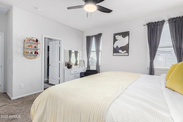 bedroom with carpet floors, ceiling fan, and baseboards