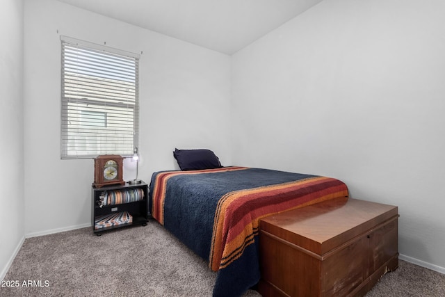 carpeted bedroom with baseboards