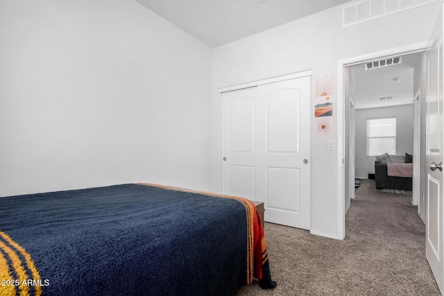 carpeted bedroom with visible vents