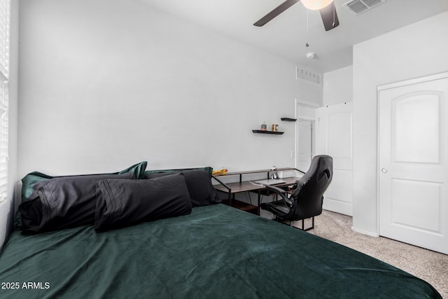 bedroom with a ceiling fan, carpet, and visible vents