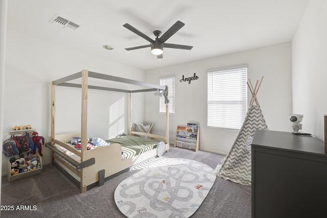 carpeted bedroom with ceiling fan