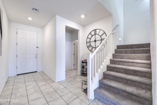 view of tiled foyer entrance