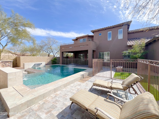 view of swimming pool with a fenced backyard, a fenced in pool, and a patio