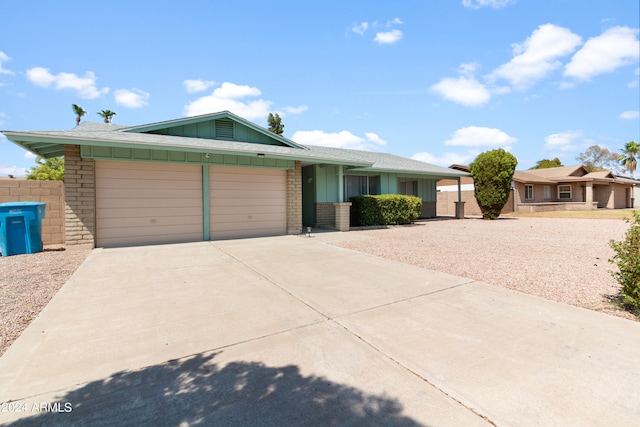 ranch-style house with a garage