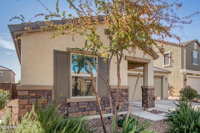 view of front of home with a garage