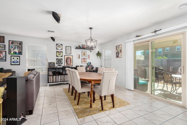 dining room featuring a chandelier