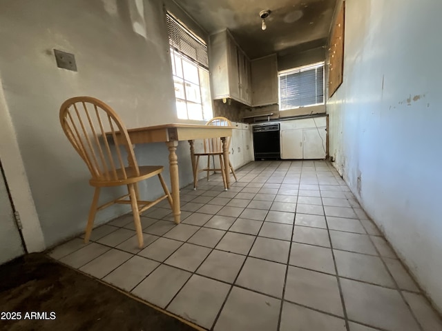 829 W Spray St, Superior, AZ 85173 - kitchen with dishwasher, light tile patterned flooring, and white cabinets