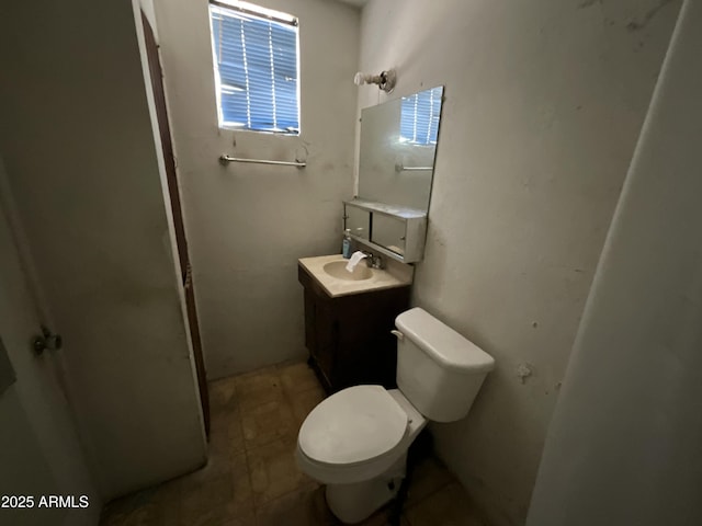 829 W Spray St, Superior, AZ 85173 - bathroom with toilet, vanity, and a shower