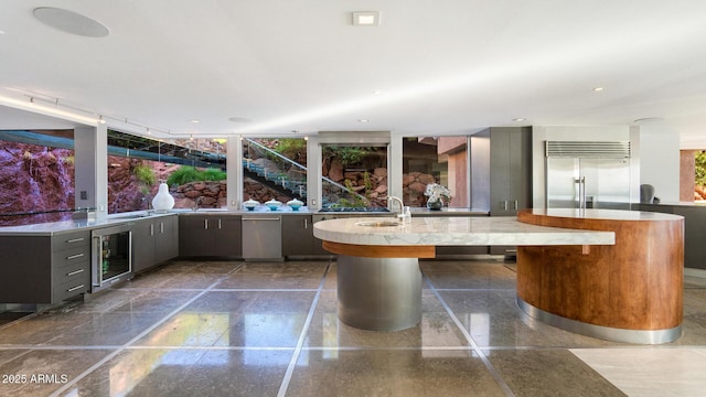 interior space with sink and beverage cooler