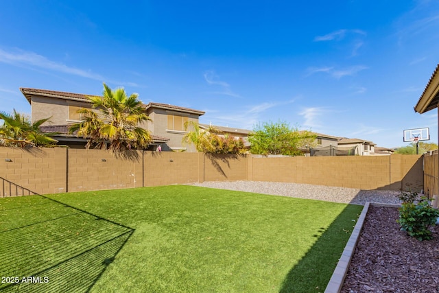 view of yard featuring a fenced backyard