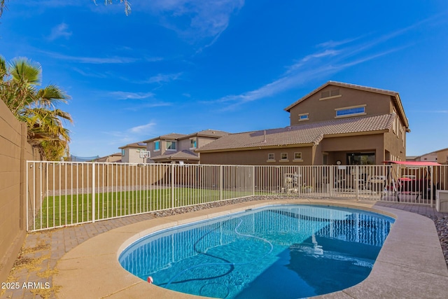 view of pool featuring a fenced in pool and a fenced backyard