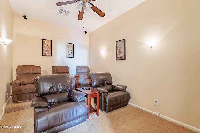 carpeted cinema with ceiling fan