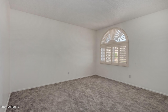 1501 E Colonial Dr, Chandler, AZ 85249 - carpeted empty room with baseboards and a textured ceiling