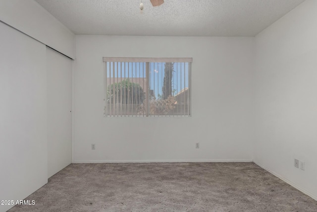 1501 E Colonial Dr, Chandler, AZ 85249 - spare room with a ceiling fan, carpet floors, and a textured ceiling