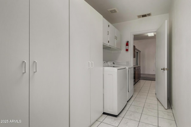 1501 E Colonial Dr, Chandler, AZ 85249 - washroom featuring cabinet space, visible vents, and washing machine and clothes dryer
