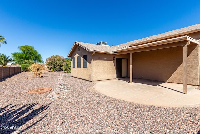 1501 E Colonial Dr, Chandler, AZ 85249 - rear view of house featuring fence, a patio, and stucco siding