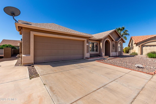1501 E Colonial Dr, Chandler, AZ 85249 - ranch-style house featuring fence, stucco siding, an attached garage, driveway, and roof with shingles
