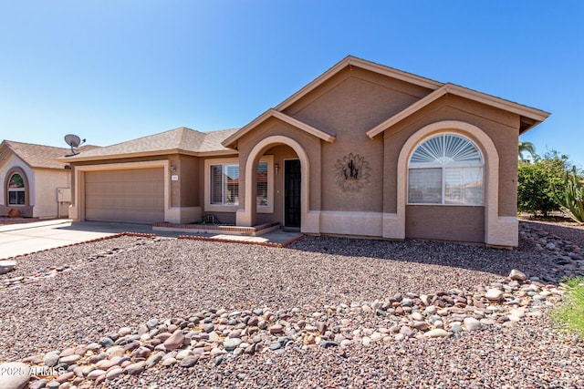 1501 E Colonial Dr, Chandler, AZ 85249 - view of front of house featuring stucco siding, driveway, and a garage