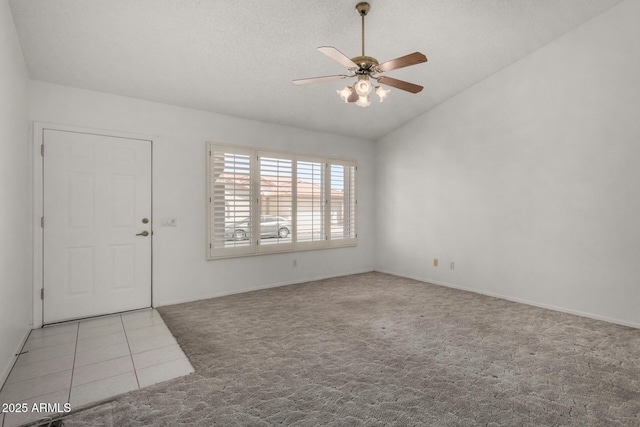 1501 E Colonial Dr, Chandler, AZ 85249 - tiled foyer with vaulted ceiling, a ceiling fan, carpet flooring, and baseboards
