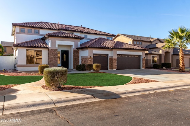 mediterranean / spanish-style home featuring a front yard and a garage