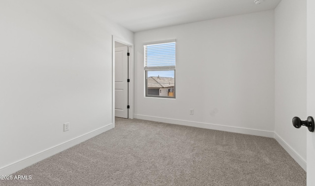 7416 S 76th Ln, Laveen, AZ 85339 - carpeted empty room with baseboards