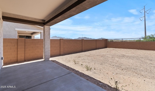7416 S 76th Ln, Laveen, AZ 85339 - fenced backyard with a patio area