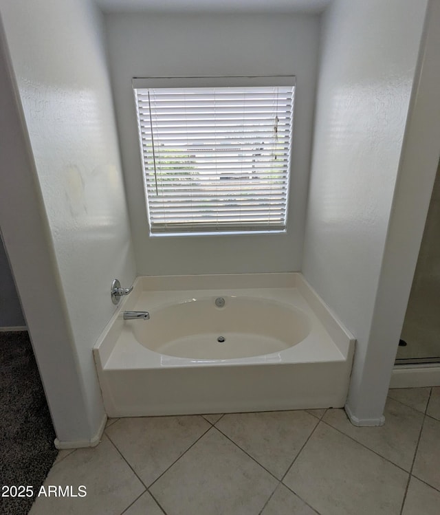 15446 W Jenan Dr, Surprise, AZ 85379 - bathroom featuring a garden tub and tile patterned flooring