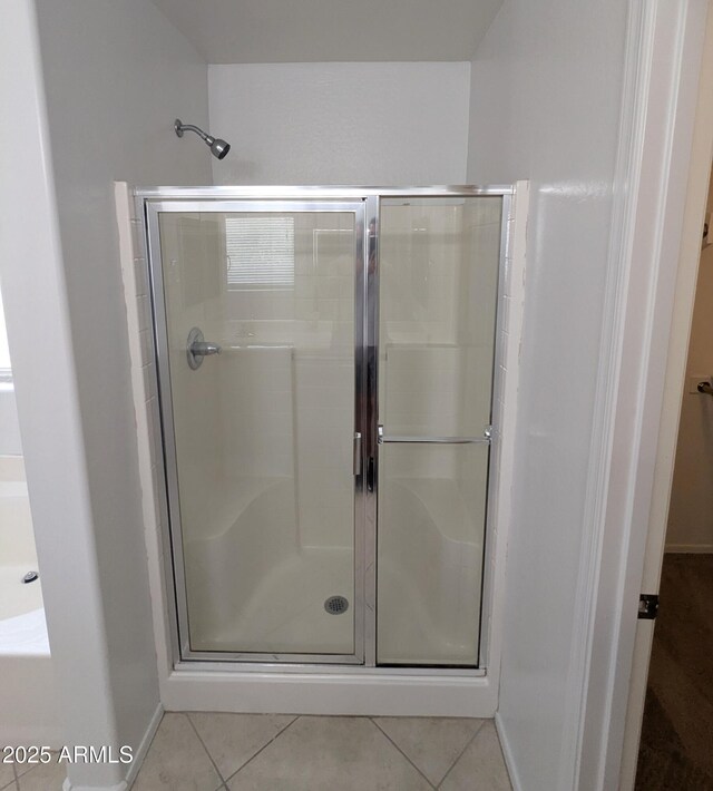 15446 W Jenan Dr, Surprise, AZ 85379 - full bath with a shower stall, tile patterned flooring, and baseboards