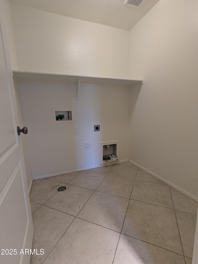 15446 W Jenan Dr, Surprise, AZ 85379 - clothes washing area featuring hookup for an electric dryer, hookup for a washing machine, hookup for a gas dryer, tile patterned floors, and baseboards