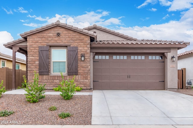 view of front of property featuring a garage