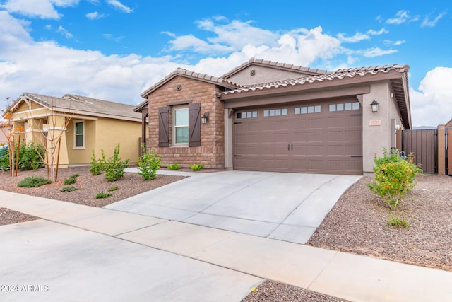 view of front of property featuring a garage