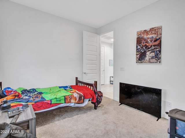 bedroom featuring carpet flooring