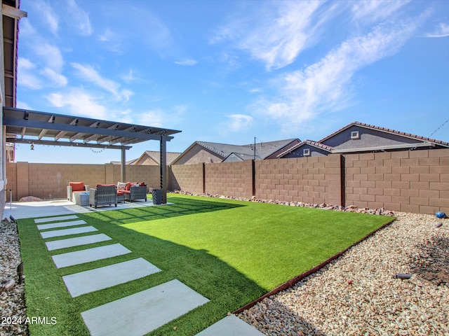 view of yard with outdoor lounge area, a pergola, and a patio