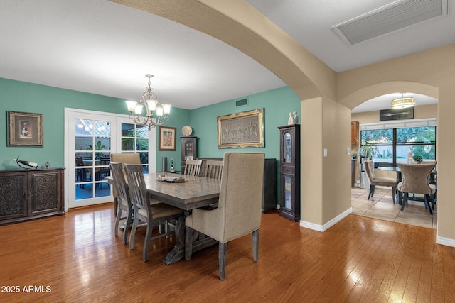 15011 N 45th Pl, Phoenix, AZ 85032 - dining room with a chandelier and light hardwood / wood-style floors