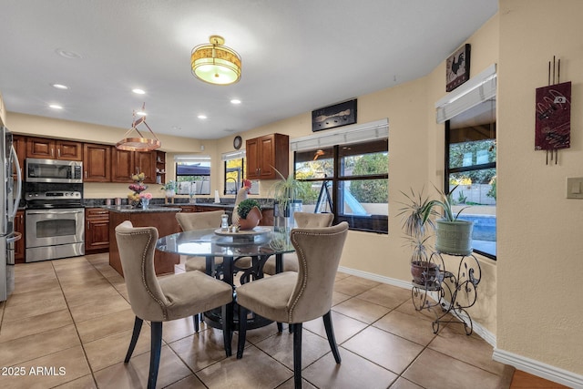 15011 N 45th Pl, Phoenix, AZ 85032 - dining space with light tile patterned floors