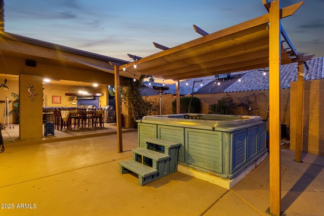 15011 N 45th Pl, Phoenix, AZ 85032 - patio terrace at dusk featuring exterior bar and a hot tub