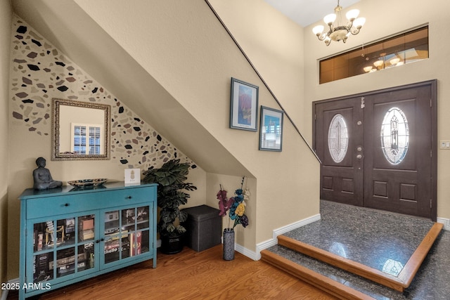 15011 N 45th Pl, Phoenix, AZ 85032 - entrance foyer featuring wood-type flooring, a chandelier, and vaulted ceiling