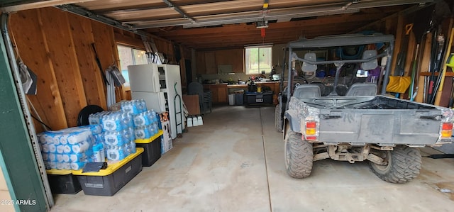 12814 E Dream Acres Ln, Parks, AZ 86018 - garage featuring freestanding refrigerator