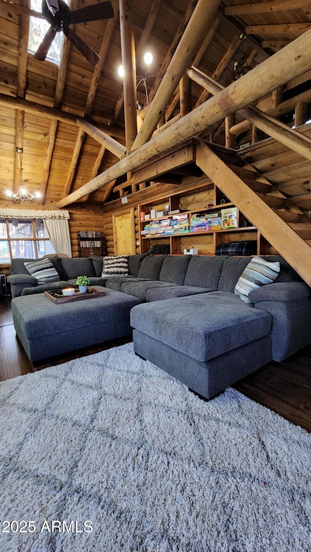 12814 E Dream Acres Ln, Parks, AZ 86018 - living area with wooden ceiling with exposed beams, hardwood / wood-style floors, and high vaulted ceiling