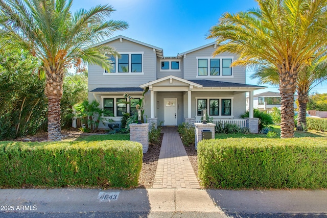 view of front of house with covered porch